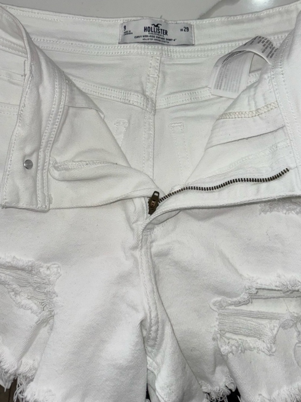 Hollister White Distressed Cutoff Denim Shorts